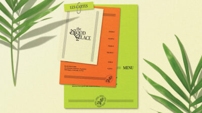 Cartes et menus imprimés aux teintes vertes et orangées accompagnés d’éléments végétaux, projet étudiant de branding et direction artistique pour un établissement de restauration.