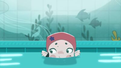 Personnage observant un aquarium