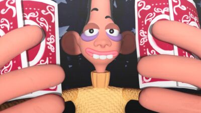 Personnage stylisé entouré de cartes à jouer dans une ambiance de spectacle de magie, création 3D réalisée par des étudiants en animation.