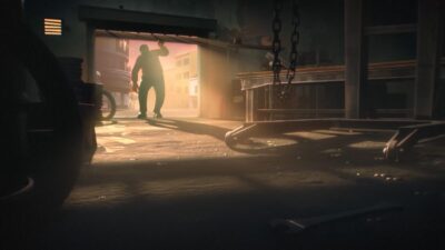 Extrait d'un film d'animation où un personnage à contre-jour entre dans un garage sombre