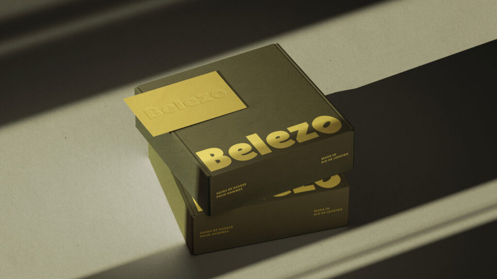 Boîte de packaging noire et dorée avec le nom “Belezo"
